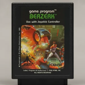 Berzerk Atari 2600 game cartridge with green title label showing a hero shooting an exploding red robot in a maze.