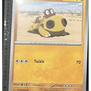Hippopotas 052/131 Pokemon trading card - Prismatic Evolutions
